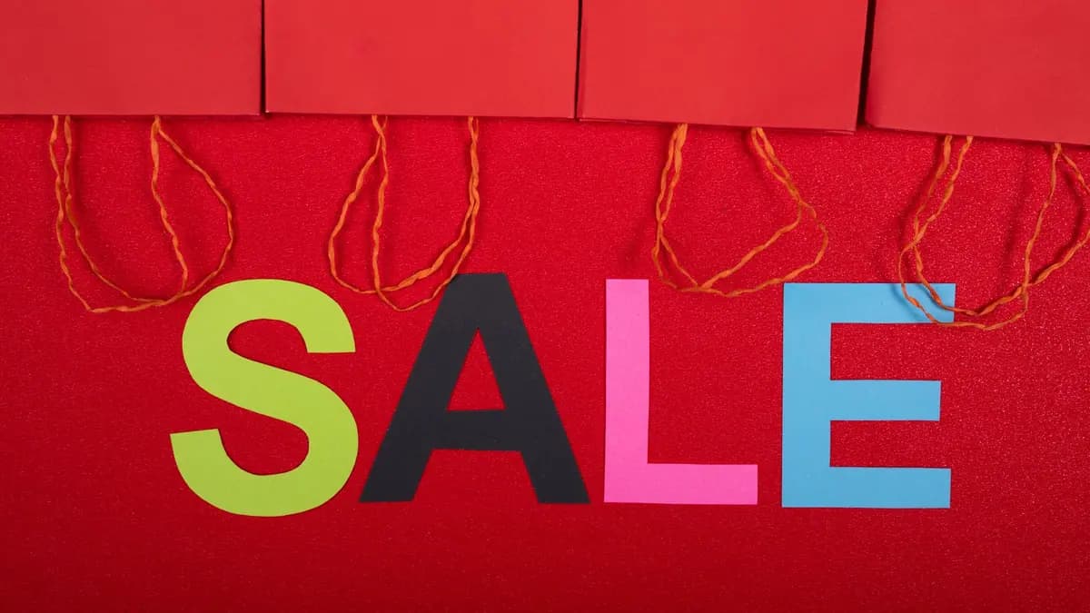 A sale sign in a shop window