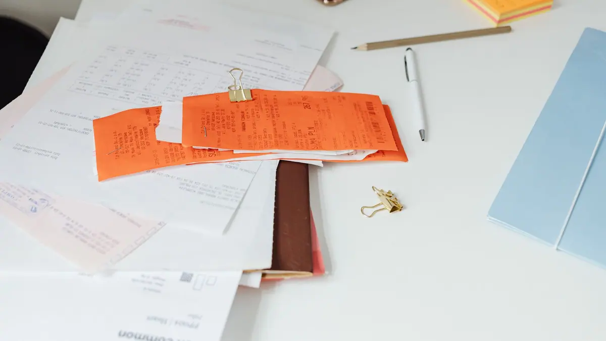 A receipt and product documentation on a table