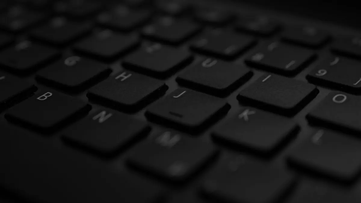 A close-up of a laptop keyboard and trackpad