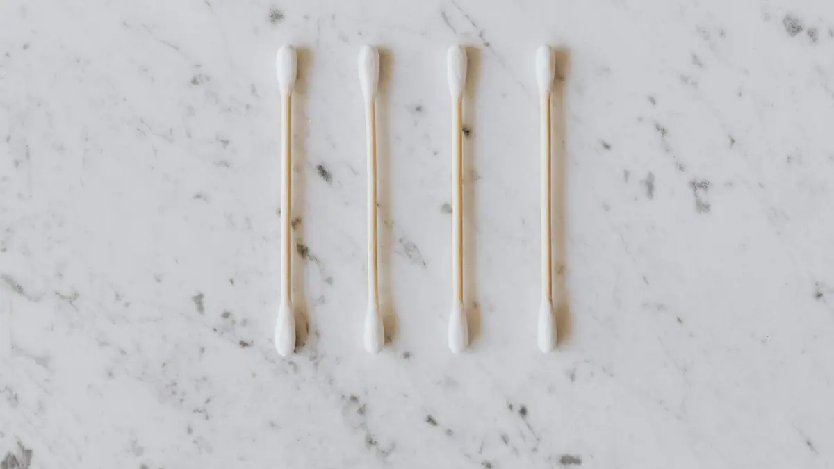 Several sizes of silicone ear tips laid out on a surface