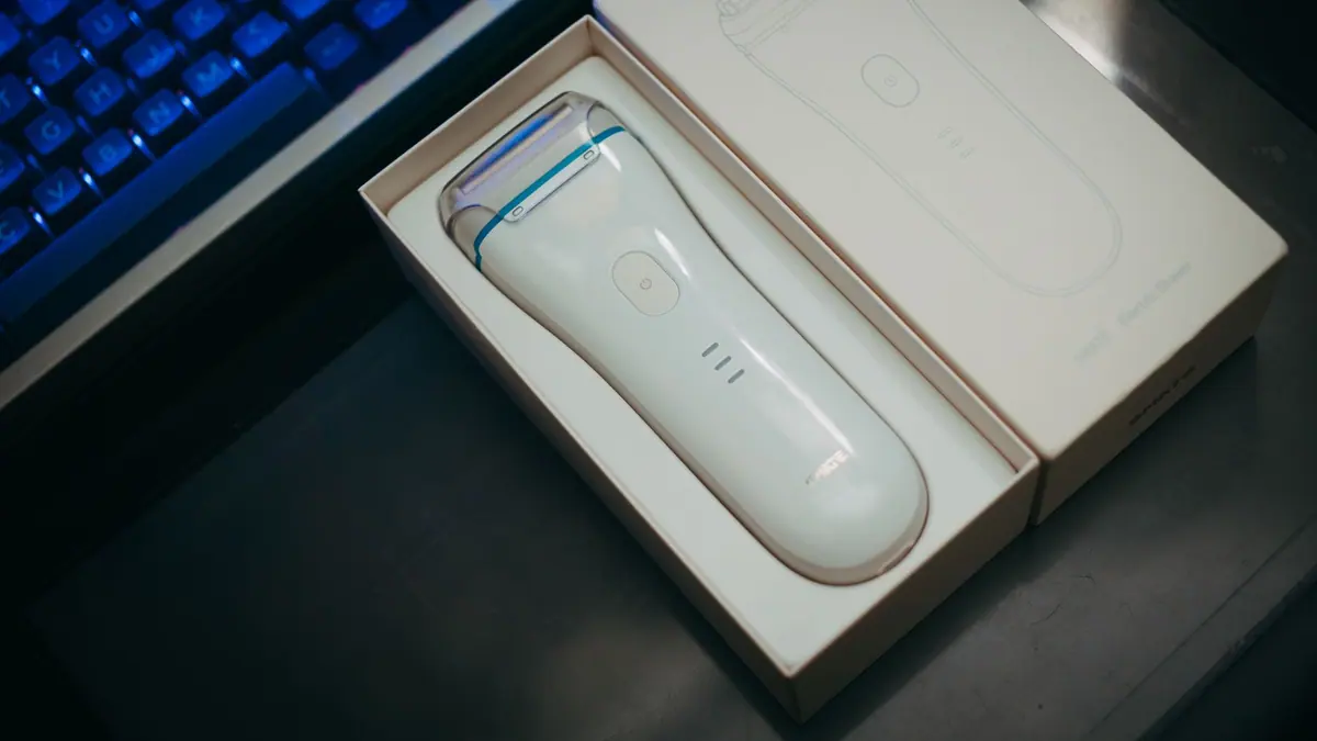 An electric shaver on a bathroom counter